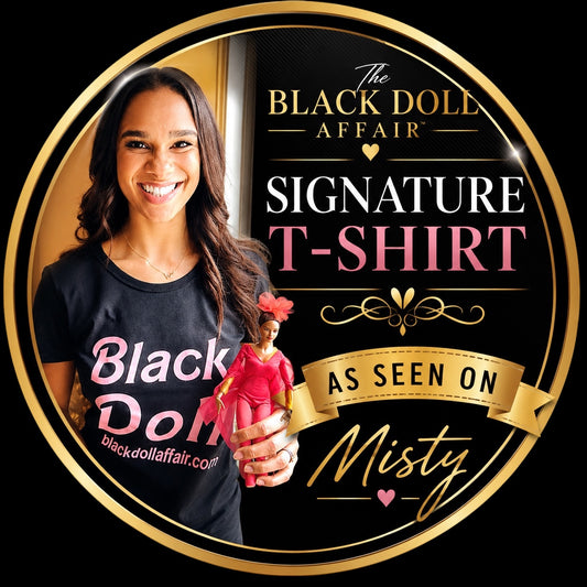 Honorary Black Doll Misty Copeland, holding Mattel's Misty Copeland Barbie doll, wearing The Black Doll Affair Signature Members T-shirt, celebrating representation, sisterhood, and self-esteem.