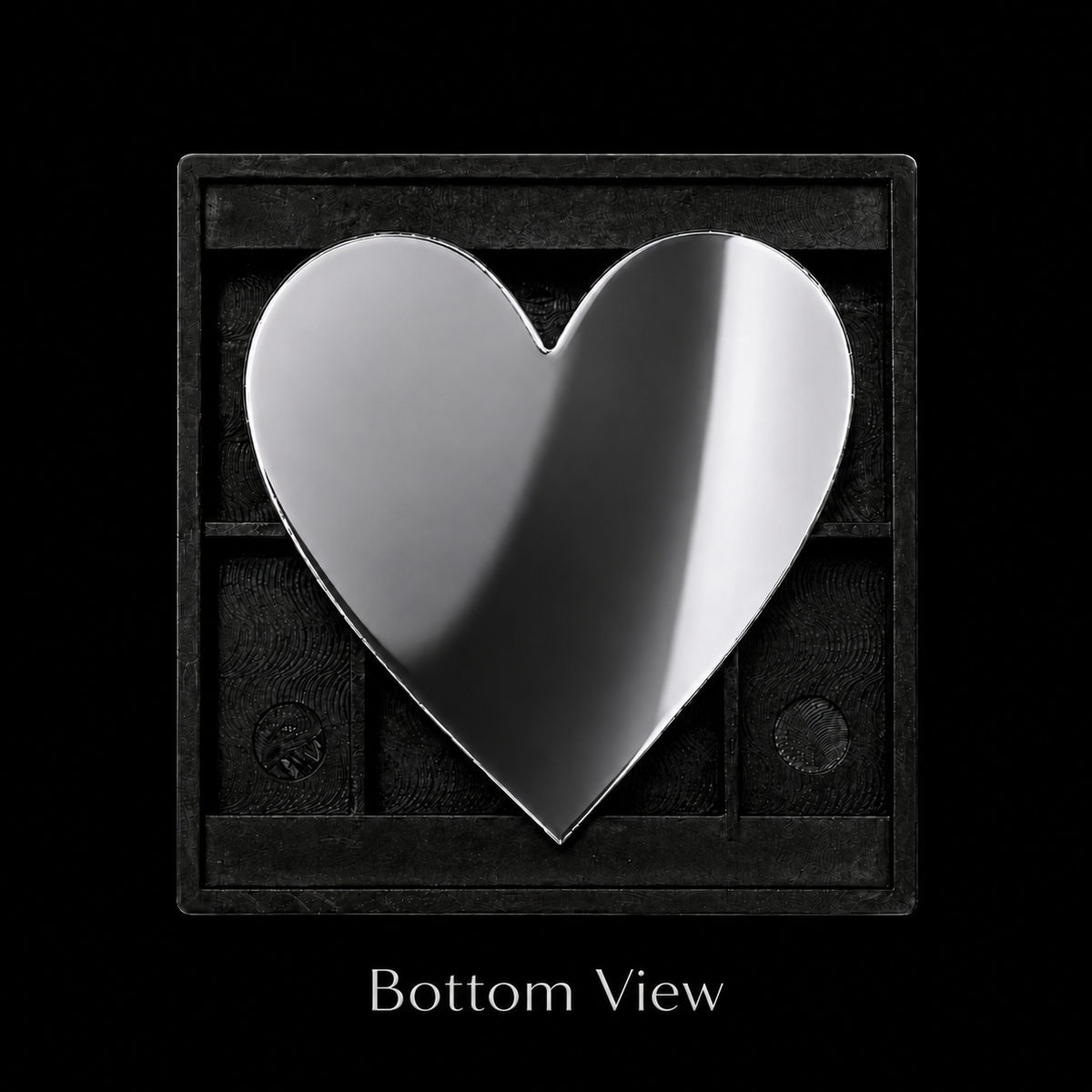 Bottom of The Black Doll Affair's ME Doll showcase bottom with a heart shaped mirror.