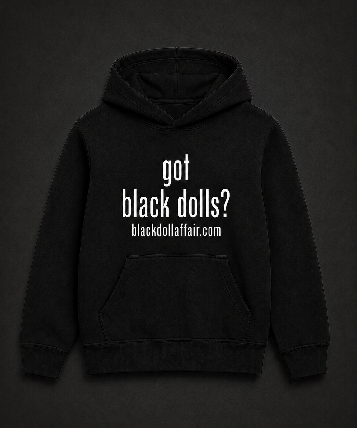 Black Doll Affair black pullover hoodie with white text on the front reading 'got black dolls? blackdollaffair.com', shown against a dark charcoal background.